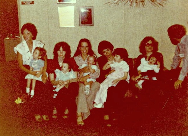 Families with children with trisomy 18 and trisomy 13 seated together at the First Gathering in Salt Lake City, May 1980. Dr. John Carey is at far right.