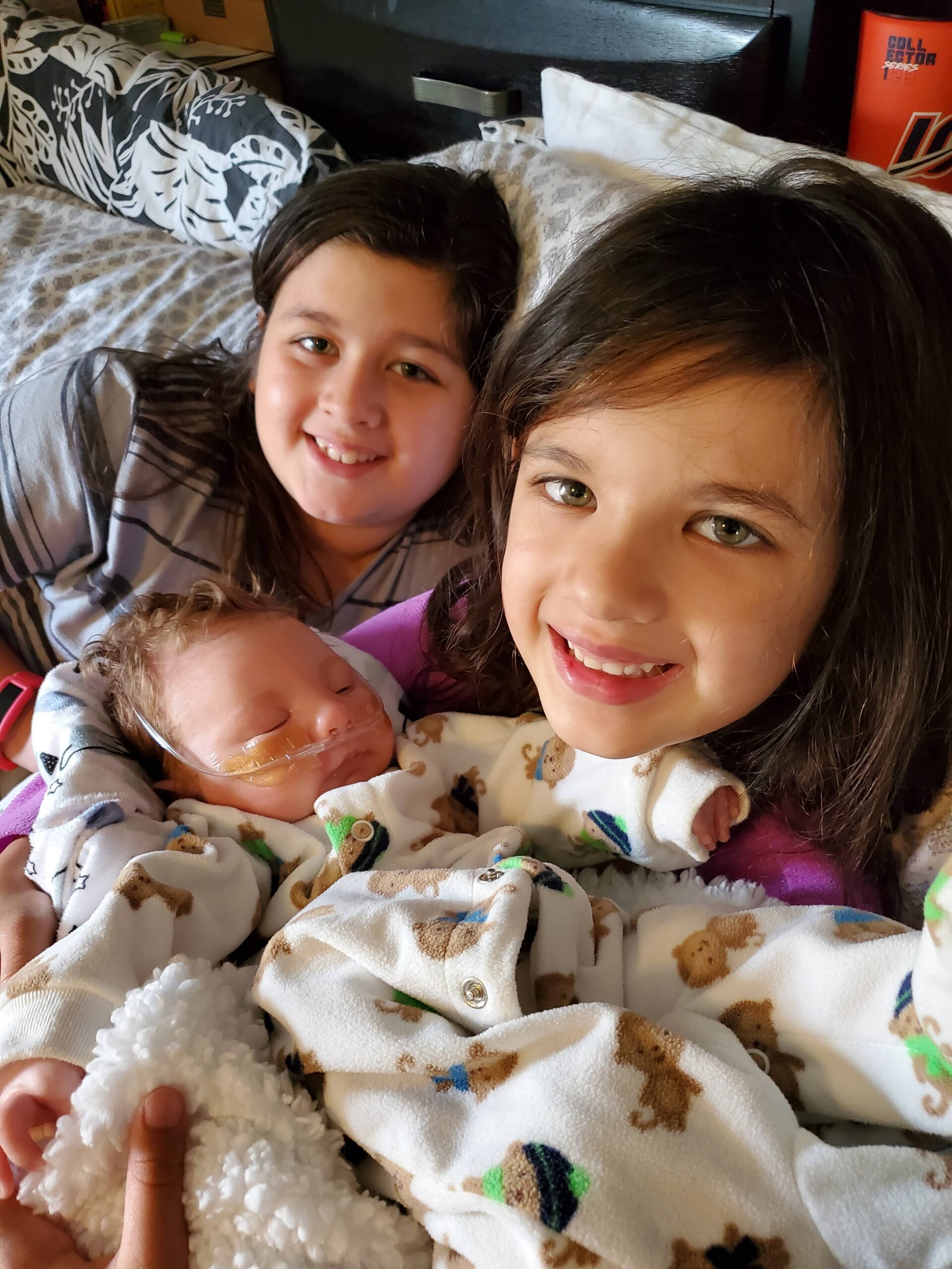 Patrick with big sisters Sophia and Ariana Jerzyk — Trisomy 9 family