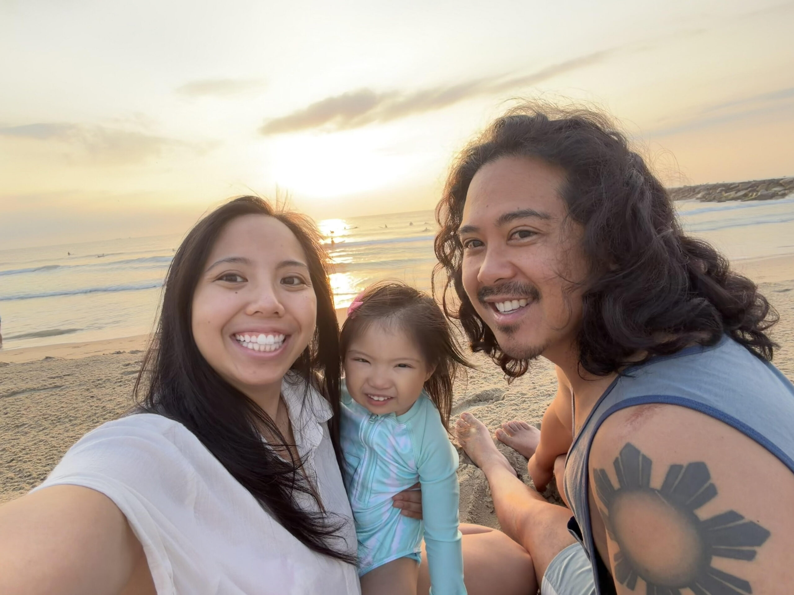 Ashley and Alex Sibal with their daughter Aliana in Virginia Beach