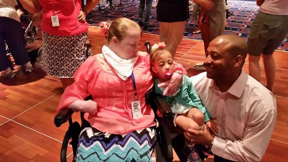 Stacy VanHerreweghe Trisomy 18 with her pink army friends and family